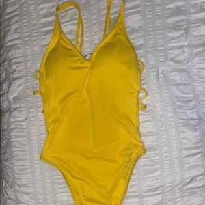 Yellow open back one piece swimsuit